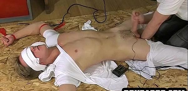  Blindfolded and tied up hunk gets his cock tugged